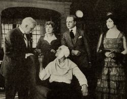 Gladden James and Gail Kane in Paying the Price (1916)