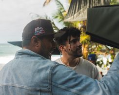 Arí Maniel with Bad Bunny on set for 