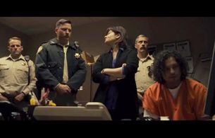 Michelle Rios (Flora) and Aden Young (Sheriff Randall) in a scene from 