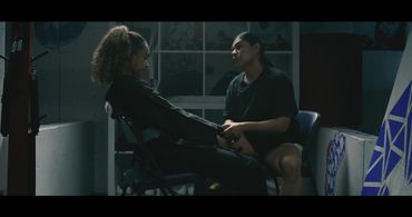 Coach Koko talking with Mili