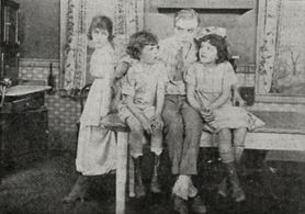 Helen Badgley, Tula Belle, Gordon Dooley, and Ray Dooley in A Rag, a Bone and a Hank of Hair (1917)