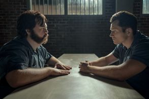 Paul Walter Hauser and Taron Egerton in Black Bird (2022)