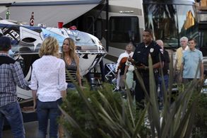 Elimu Nelson, Fred Willard, and Andrea Anders in Modern Family (2009)