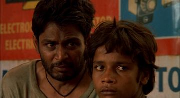 Shafiq Syed and Raghuvir Yadav in Salaam Bombay! (1988)