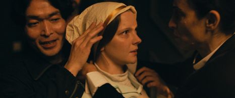 Takatsuna Mukai, Noa Bodner, and Morfydd Clark in Saint Maud (2019)