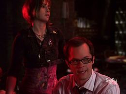 Neil Grayston and Allison Scagliotti in Warehouse 13 (2009)