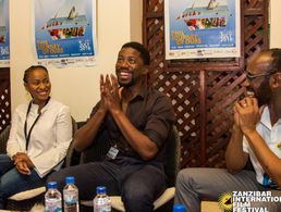 Atandwa (Philemon) and co-star Phuti Nakene (Matilda) at the Zanzibar International Film Festival for The Suit