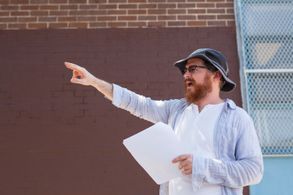 On the set of MANDATED, Director Jesse R. Tendler in action at the 