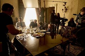 (l-r) Devon Sawa as James Collins, Callum Vinson as Henry Collins, and Chucky appear behind the scenes in Chucky 301.