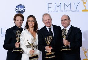 Jerry Bruckheimer, Jonathan Littman, Bertram van Munster, and Elise Doganieri at an event for The 64th Primetime Emmy Aw