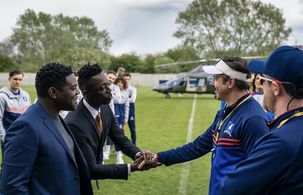 Brendan Hunt, Jason Sudeikis, Sam Richardson, Phil Dunster, and Edwin De La Renta in Ted Lasso (2020)