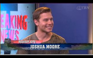 Joshua Moore being interviewed about 