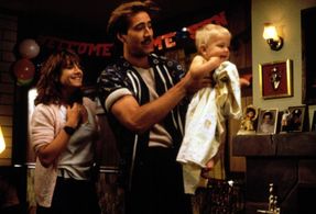 Nicolas Cage, Holly Hunter, and T.J. Kuhn in Raising Arizona (1987)