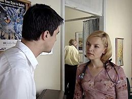 Justine Clarke and Ben Tari in All Saints (1998)