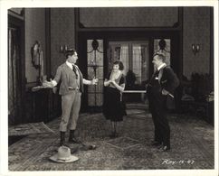 Ora Carew, Harry Dunkinson, and Tom Mix in The Big Town Round-Up (1921)