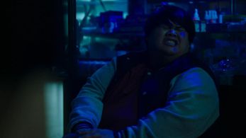 Romel De Silva as Mo Chen gets shot.