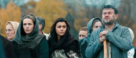 Ostap Stupka, Lucy Brown, and Samantha Barks in Bitter Harvest (2017)