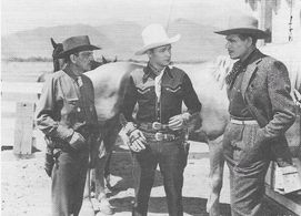 Roy Rogers, Dennis Hoey, Francis McDonald, and Trigger in Roll on Texas Moon (1946)