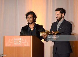Prem Singh and Michael Pugliese accept the award for Best Picture Tiger at the 2018 San Diego Film Festival