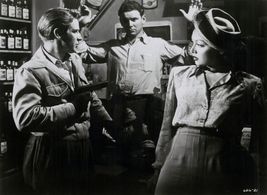 Richard Basehart and Carlotta Monti in He Walked by Night (1948)