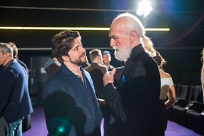 Adolfo J. Kolmerer talking to Actor David Gant at the 