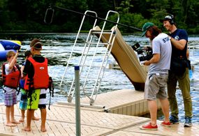 Directors of Photography Miguel Drake-McLaughlin and Rufus Lusk capture the campers negotiating their entrance into the 