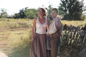 Johnny and Maggie meet outside the cabin.