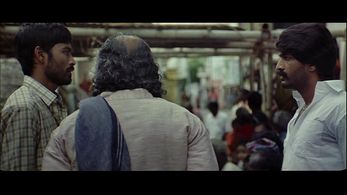 Dhanush, Kishore Kumar G., and Jayabalan in Aadukalam (2011)