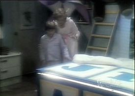 Randy Josselyn and Carol Mansell in Down to Earth (1984)