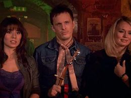 Dan Clark and Laura Haddock in How Not to Live Your Life (2007)