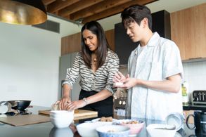Padma Lakshmi and Eric Nam in Taste the Nation with Padma Lakshmi (2020)