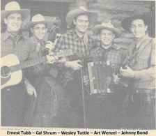 Johnny Bond, Cal Shrum, Ernest Tubb, Wesley Tuttle, Art Wenzel, and Ernest Tubb's Singing Cowboys in Riding West (1944)