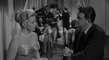 Richard Crenna and Cleo Moore in Over-Exposed (1956)