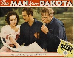 Wallace Beery, Dolores del Rio, and John Howard in The Man from Dakota (1940)