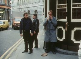 Howard Attfield, Ian McNeice, and Enn Reitel in The Optimist (1983)