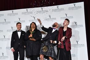 Rainbow confetti for the win! Max Currie showers his team-mates after Rūrangi wins the 2022 International Emmy for Best 