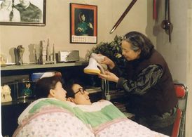 Mingqi Li, Dandan Song, and Lixin Yang in I Love My Family (1993)