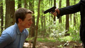 Still of Hunter Foretich and Simon Phillips in Dystopia (2019)