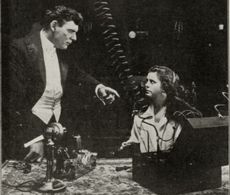 Neva Gerber and Ben F. Wilson in The Voice on the Wire (1917)