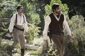 Jake Gyllenhaal and Riz Ahmed in The Sisters Brothers (2018)