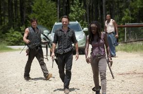 Norman Reedus, Andrew Lincoln, Vincent M. Ward, and Danai Gurira in The Walking Dead (2010)