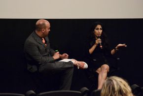 Mojan speaking on the panel at a screening of 
