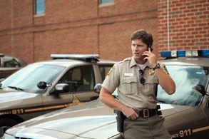 'Dept. Askew' on the phone in a scene from 'Jimmy'