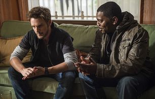 Mekhi Phifer and Riley Smith in Frequency (2016)