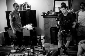 Will Cuddy testing out a shot with DP Devin Tolman on the set of 