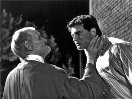 Daniel Greene and William Morgan Sheppard in Elvira: Mistress of the Dark (1988)