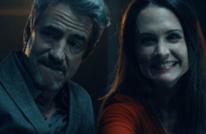 Dermot Mulroney as Bobby Sheridan and Amye Gousset as Lena Dash on The Purge 2.