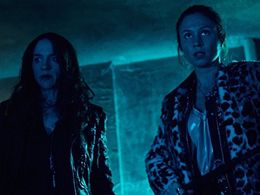 Melanie Scrofano and Dominique Provost-Chalkley in Wynonna Earp (2016)