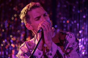 Ed Skrein and Sanja Bucko in I Used to Be Famous (2022)