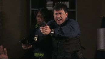 John Prudhont as FDLE Agent Ed Royal & Patricia Simmons as Det. Cooper in Season 5, Episode 8 of 